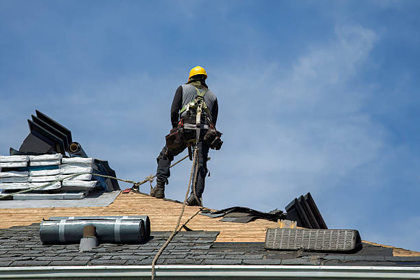 Professional Roof Replacement technician working in Lester, WV
